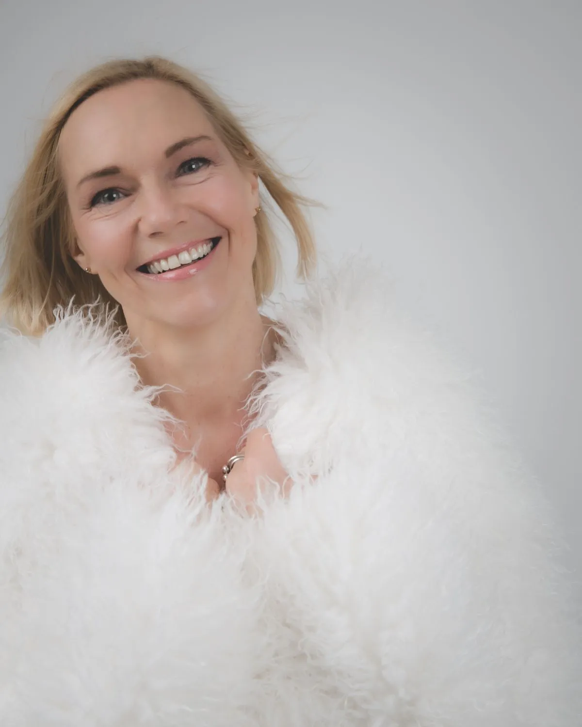 Cathy in white fluffy jacket