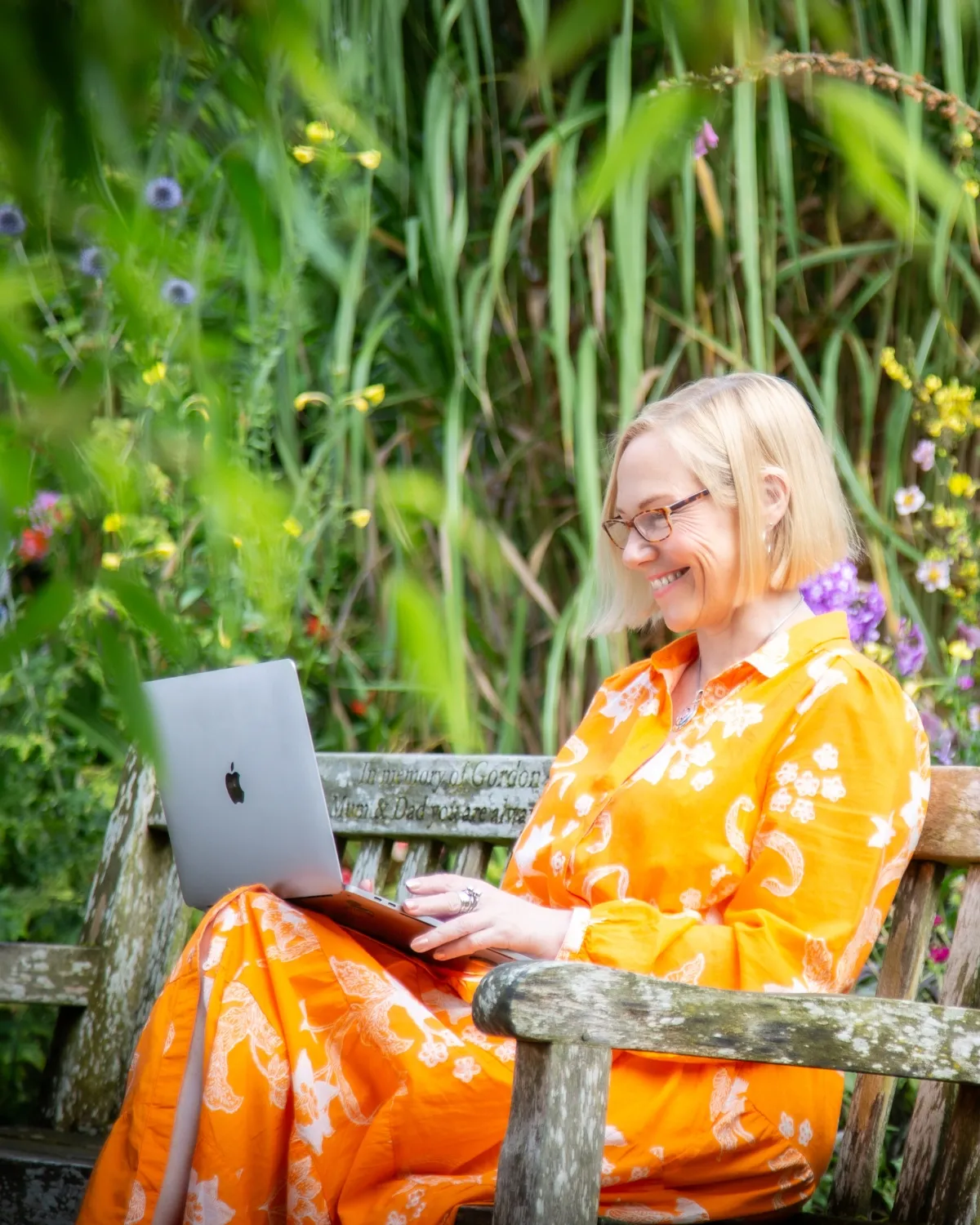 Cathy on video call in garden